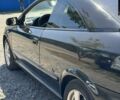 Черный Опель Астра, объемом двигателя 1.8 л и пробегом 286 тыс. км за 3300 $, фото 7 на Automoto.ua