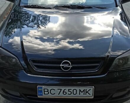 Черный Опель Астра, объемом двигателя 2.2 л и пробегом 285 тыс. км за 2950 $, фото 3 на Automoto.ua