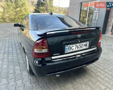 Чорний Опель Астра, об'ємом двигуна 2.2 л та пробігом 286 тис. км за 3100 $, фото 4 на Automoto.ua