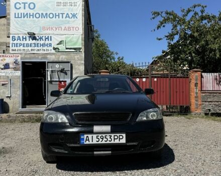 Черный Опель Астра, объемом двигателя 1.8 л и пробегом 286 тыс. км за 3300 $, фото 2 на Automoto.ua