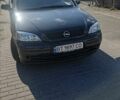 Черный Опель Астра, объемом двигателя 2 л и пробегом 200 тыс. км за 2500 $, фото 1 на Automoto.ua