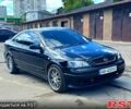 Черный Опель Астра, объемом двигателя 2 л и пробегом 185 тыс. км за 4900 $, фото 1 на Automoto.ua