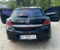 Черный Опель Астра, объемом двигателя 1.6 л и пробегом 300 тыс. км за 5000 $, фото 1 на Automoto.ua