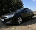 Черный Опель Астра, объемом двигателя 1.7 л и пробегом 260 тыс. км за 5000 $, фото 1 на Automoto.ua