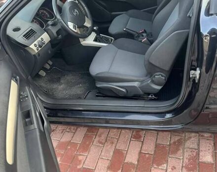 Черный Опель Астра, объемом двигателя 1.4 л и пробегом 234 тыс. км за 4400 $, фото 10 на Automoto.ua