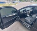 Черный Опель Астра, объемом двигателя 1.4 л и пробегом 185 тыс. км за 5350 $, фото 6 на Automoto.ua