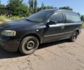 Черный Опель Астра, объемом двигателя 1.7 л и пробегом 310 тыс. км за 1600 $, фото 1 на Automoto.ua