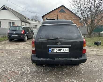 Черный Опель Астра, объемом двигателя 1.7 л и пробегом 200 тыс. км за 1200 $, фото 3 на Automoto.ua