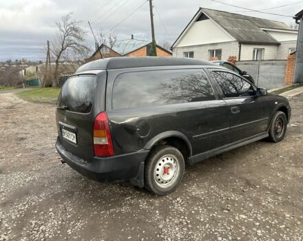 Черный Опель Астра, объемом двигателя 1.7 л и пробегом 200 тыс. км за 1200 $, фото 2 на Automoto.ua
