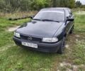Черный Опель Астра, объемом двигателя 1.4 л и пробегом 270 тыс. км за 1750 $, фото 1 на Automoto.ua