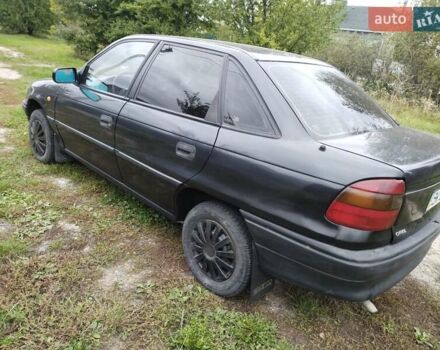 Черный Опель Астра, объемом двигателя 1.4 л и пробегом 270 тыс. км за 1750 $, фото 4 на Automoto.ua