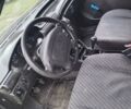 Черный Опель Астра, объемом двигателя 1.4 л и пробегом 270 тыс. км за 1750 $, фото 2 на Automoto.ua