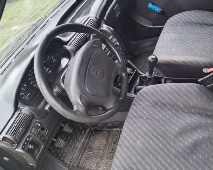 Черный Опель Астра, объемом двигателя 1.8 л и пробегом 270 тыс. км за 1750 $, фото 7 на Automoto.ua