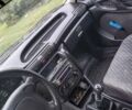 Черный Опель Астра, объемом двигателя 1.4 л и пробегом 270 тыс. км за 1750 $, фото 6 на Automoto.ua