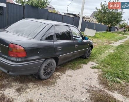Черный Опель Астра, объемом двигателя 1.4 л и пробегом 270 тыс. км за 1750 $, фото 7 на Automoto.ua