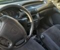 Черный Опель Астра, объемом двигателя 1.6 л и пробегом 175 тыс. км за 1700 $, фото 1 на Automoto.ua