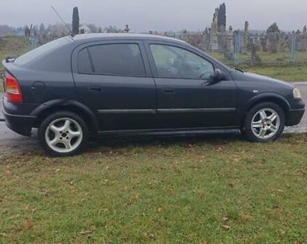 Черный Опель Астра, объемом двигателя 1.6 л и пробегом 171 тыс. км за 2199 $, фото 7 на Automoto.ua