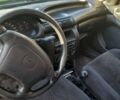 Черный Опель Астра, объемом двигателя 1.6 л и пробегом 175 тыс. км за 1700 $, фото 1 на Automoto.ua
