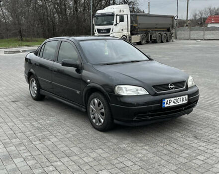 Черный Опель Астра, объемом двигателя 1.6 л и пробегом 205 тыс. км за 1999 $, фото 6 на Automoto.ua