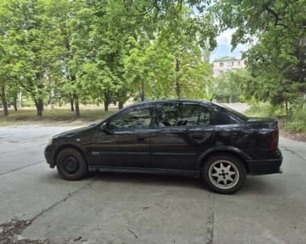 Черный Опель Астра, объемом двигателя 1.6 л и пробегом 202 тыс. км за 2200 $, фото 7 на Automoto.ua