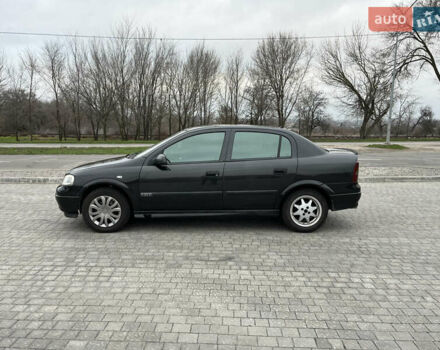 Черный Опель Астра, объемом двигателя 1.6 л и пробегом 205 тыс. км за 1999 $, фото 1 на Automoto.ua