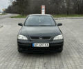 Черный Опель Астра, объемом двигателя 1.6 л и пробегом 205 тыс. км за 1999 $, фото 7 на Automoto.ua
