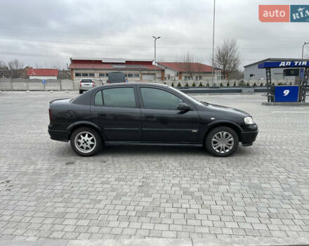 Черный Опель Астра, объемом двигателя 1.6 л и пробегом 205 тыс. км за 1999 $, фото 5 на Automoto.ua