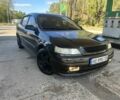 Черный Опель Астра, объемом двигателя 1.6 л и пробегом 251 тыс. км за 3500 $, фото 1 на Automoto.ua