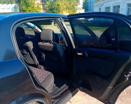 Черный Опель Астра, объемом двигателя 1.6 л и пробегом 327 тыс. км за 3500 $, фото 4 на Automoto.ua