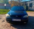 Черный Опель Астра, объемом двигателя 1.6 л и пробегом 327 тыс. км за 3500 $, фото 1 на Automoto.ua