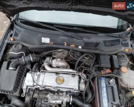 Черный Опель Астра, объемом двигателя 2 л и пробегом 350 тыс. км за 3199 $, фото 4 на Automoto.ua