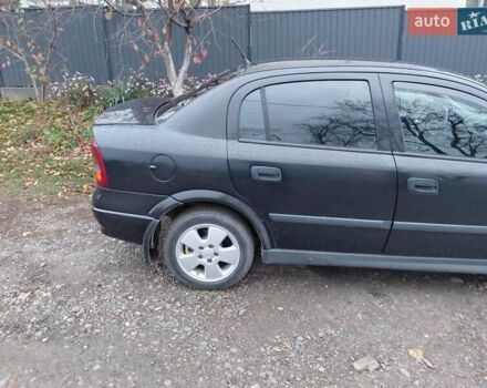 Черный Опель Астра, объемом двигателя 2 л и пробегом 350 тыс. км за 3199 $, фото 12 на Automoto.ua
