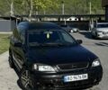 Черный Опель Астра, объемом двигателя 5 л и пробегом 350 тыс. км за 1400 $, фото 1 на Automoto.ua