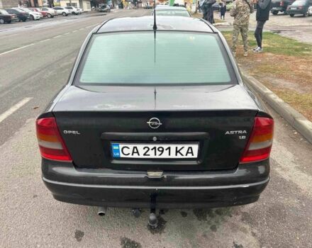 Черный Опель Астра, объемом двигателя 1.6 л и пробегом 290 тыс. км за 3000 $, фото 1 на Automoto.ua