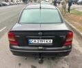 Черный Опель Астра, объемом двигателя 1.6 л и пробегом 290 тыс. км за 3000 $, фото 1 на Automoto.ua