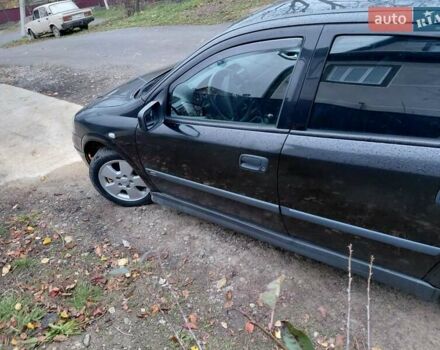 Черный Опель Астра, объемом двигателя 2 л и пробегом 350 тыс. км за 3199 $, фото 10 на Automoto.ua