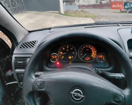 Черный Опель Астра, объемом двигателя 2 л и пробегом 350 тыс. км за 3199 $, фото 7 на Automoto.ua