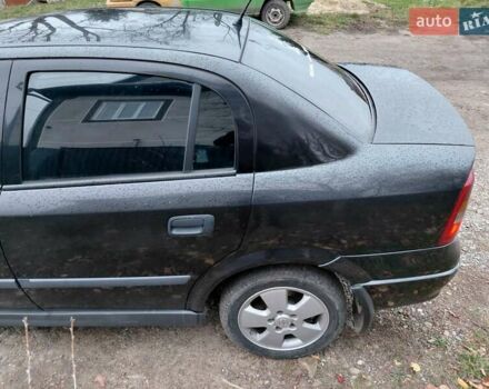 Черный Опель Астра, объемом двигателя 2 л и пробегом 350 тыс. км за 3199 $, фото 5 на Automoto.ua