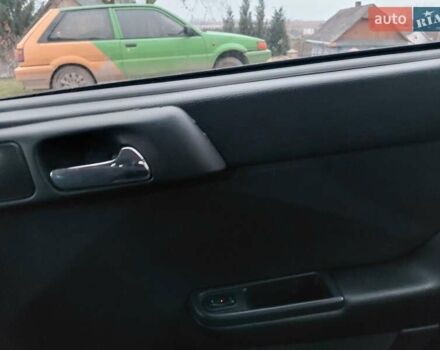 Черный Опель Астра, объемом двигателя 2 л и пробегом 350 тыс. км за 3199 $, фото 2 на Automoto.ua