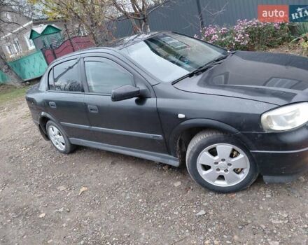 Черный Опель Астра, объемом двигателя 2 л и пробегом 350 тыс. км за 3199 $, фото 14 на Automoto.ua