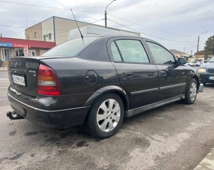 Черный Опель Астра, объемом двигателя 1.6 л и пробегом 290 тыс. км за 3000 $, фото 6 на Automoto.ua