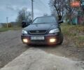Черный Опель Астра, объемом двигателя 2 л и пробегом 350 тыс. км за 3199 $, фото 1 на Automoto.ua