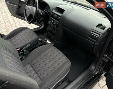 Черный Опель Астра, объемом двигателя 1.4 л и пробегом 205 тыс. км за 3800 $, фото 22 на Automoto.ua