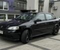 Черный Опель Астра, объемом двигателя 1.4 л и пробегом 205 тыс. км за 3900 $, фото 12 на Automoto.ua
