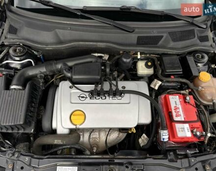 Черный Опель Астра, объемом двигателя 1.4 л и пробегом 205 тыс. км за 3800 $, фото 25 на Automoto.ua