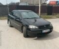 Черный Опель Астра, объемом двигателя 1.39 л и пробегом 270 тыс. км за 3000 $, фото 1 на Automoto.ua