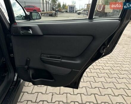 Черный Опель Астра, объемом двигателя 1.4 л и пробегом 205 тыс. км за 3800 $, фото 21 на Automoto.ua
