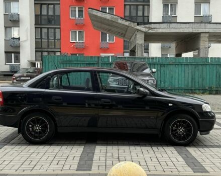 Черный Опель Астра, объемом двигателя 1.4 л и пробегом 205 тыс. км за 3900 $, фото 5 на Automoto.ua