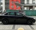 Черный Опель Астра, объемом двигателя 1.4 л и пробегом 205 тыс. км за 3900 $, фото 5 на Automoto.ua