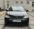 Черный Опель Астра, объемом двигателя 1.4 л и пробегом 205 тыс. км за 3900 $, фото 8 на Automoto.ua